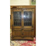 An 'Old Charm' oak bookcase and another, (2).