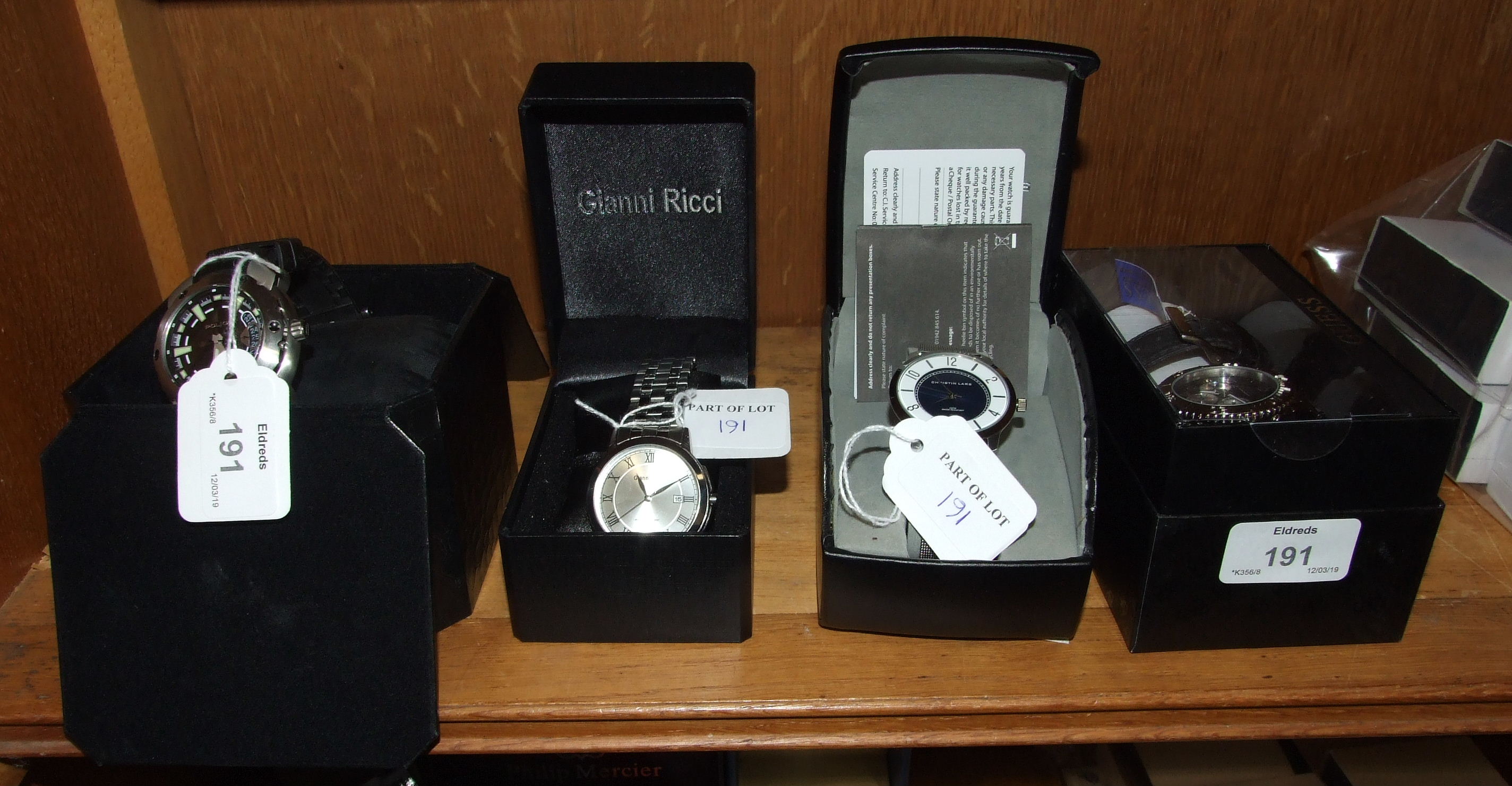 Four gents wrist watches by 'Police', 'Christin Lars', 'Guess' and 'Gianni Ricci', all boxed with