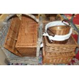 A collection of picnic baskets and others.