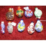 Nine reproduction Oriental glass and porcelain decorated snuff bottles, (9).