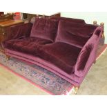 A 'Duresta' Knoll-style deep-seated settee, in plum-coloured upholstery.