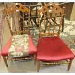 A pair of 19th century fruit wood bobbin-turned nursing chairs, with open backs and upholstered