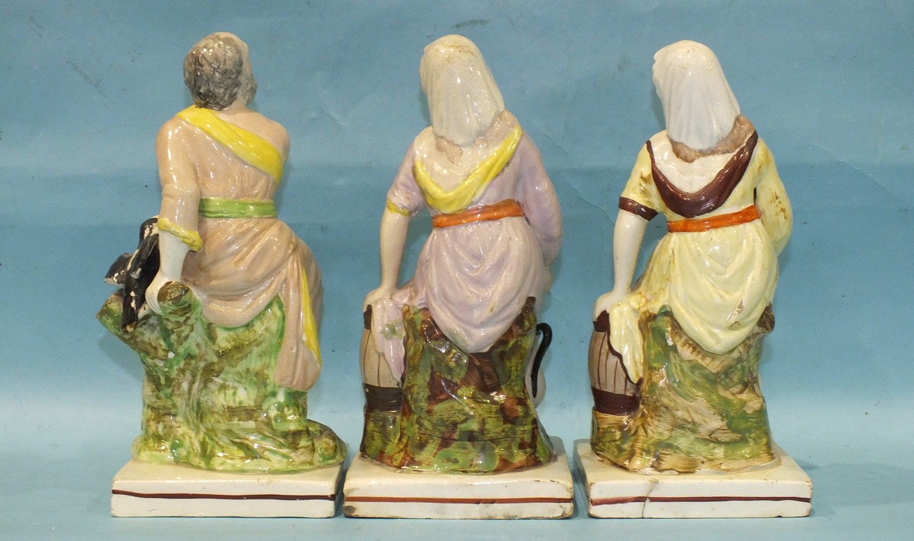 A pair of early-19th century Staffordshire pearlware square-based figures of Elijah and the widow - Image 2 of 3