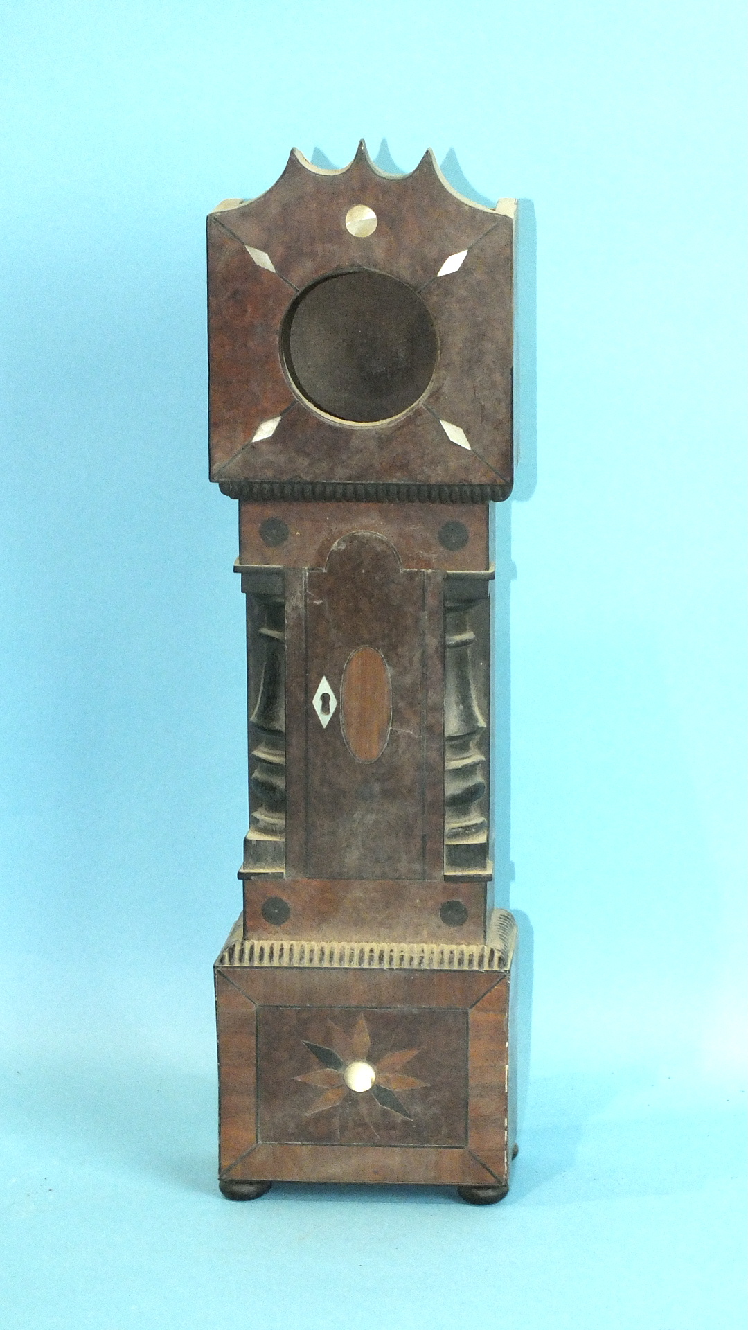 A watch holder in the form of a North Country long case clock, mother of pearl inlaid walnut, 34cm