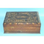 A late 19th century marquetry work box, the lid inlaid with an eagle and motto Forget-Me-Not, on a