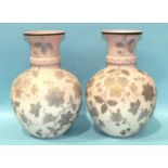 A pair of late-Victorian pale pink opaque glass vases decorated with flowering shrubs, monogram