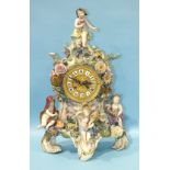 A large 19th century Meissen porcelain clock applied with figures representing the four seasons