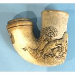 A 19th century continental meerschaum pipe bowl of large proportions, carved in relief with a pack