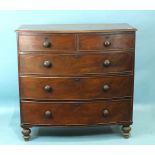 A mahogany bow-fronted chest of two short and three long cockbeaded drawers, on turned legs, 106cm