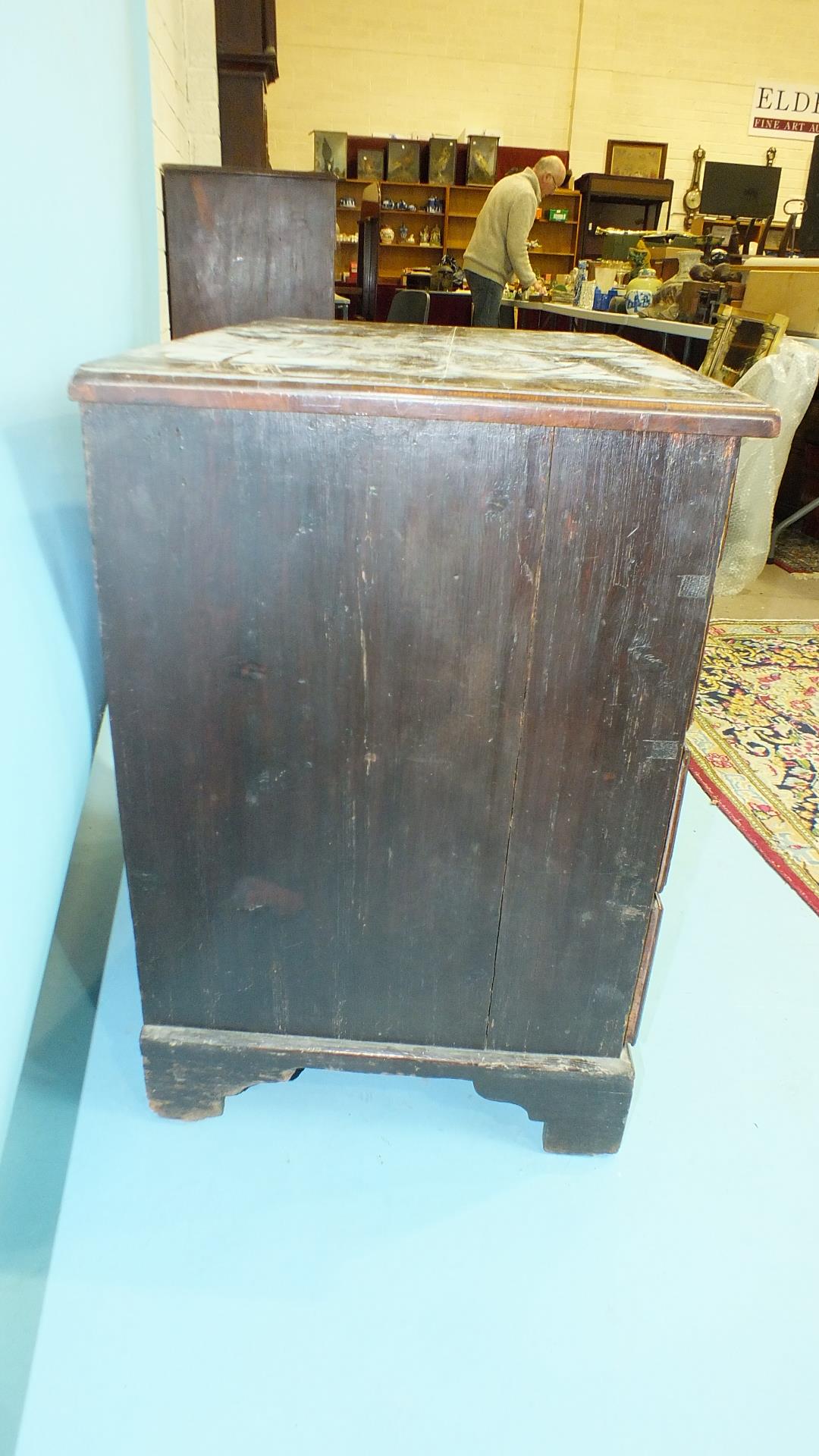 An early-18th century mahogany small chest of four long drawers, on bracket feet, 83cm wide, 79cm - Image 4 of 5