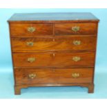 A Georgian mahogany rectangular chest of two short and three long drawers, on bracket feet, 107cm