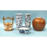 A pair of 19th century Chinese small blue and white vases decorated with birds in branches, a