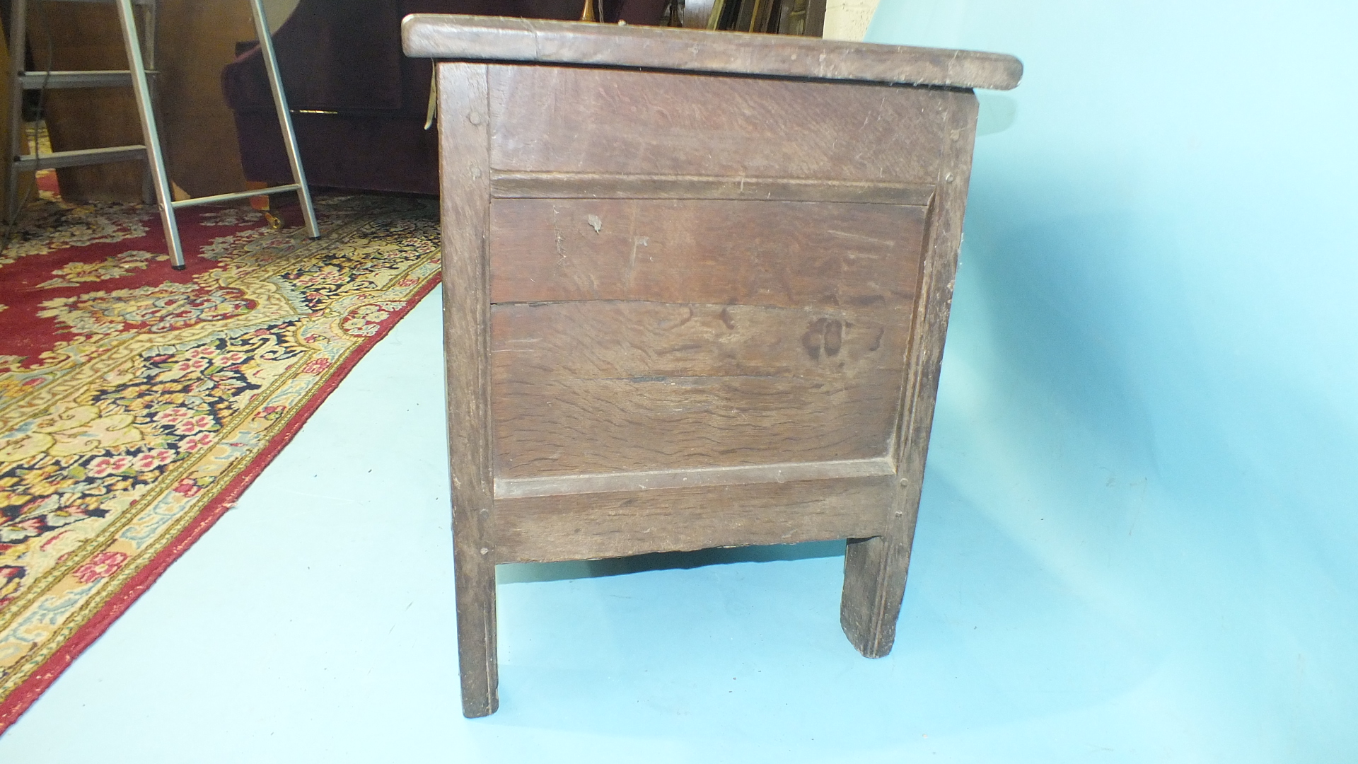 A 17th/18th century small coffer, the two-panel lid above a carved frieze and panel body, the stiles - Image 4 of 5