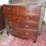 A Late-Georgian mahogany bow-fronted chest of two short and three long cockbeaded drawers, on