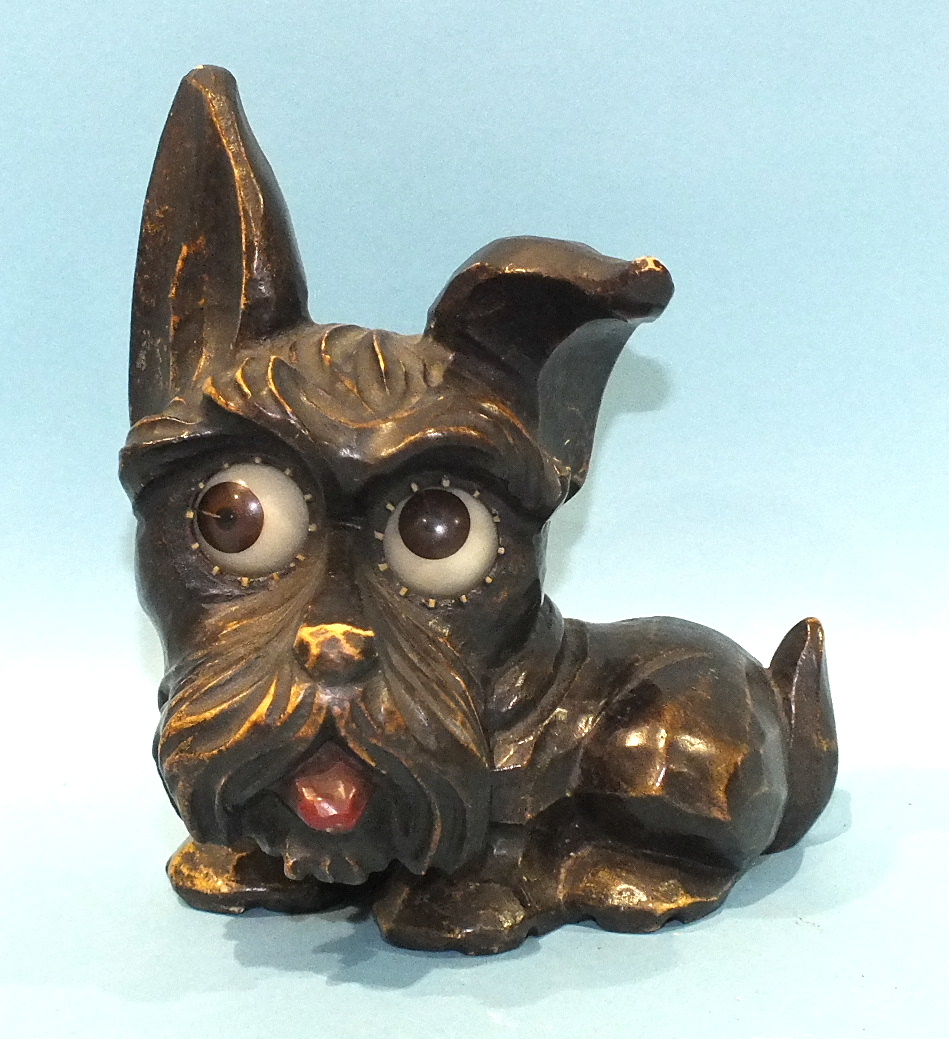 A J Oswald Black Forest carved wood Scottie dog clock, 15cm high, (clock movement not working).