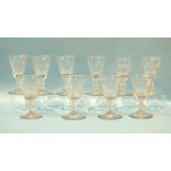 A set of ten small cut wine glasses, 11 - 11.5cm.