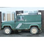 A Land Rover Defender 90 2.5L Tdi pick-up, hard top, registration P928 NRL, 107,000 miles.