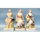 A pair of early-19th century Staffordshire pearlware square-based figures of Elijah and the widow