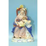 A 19th century Staffordshire pearlware figure of a mother and child reading a book, in the style