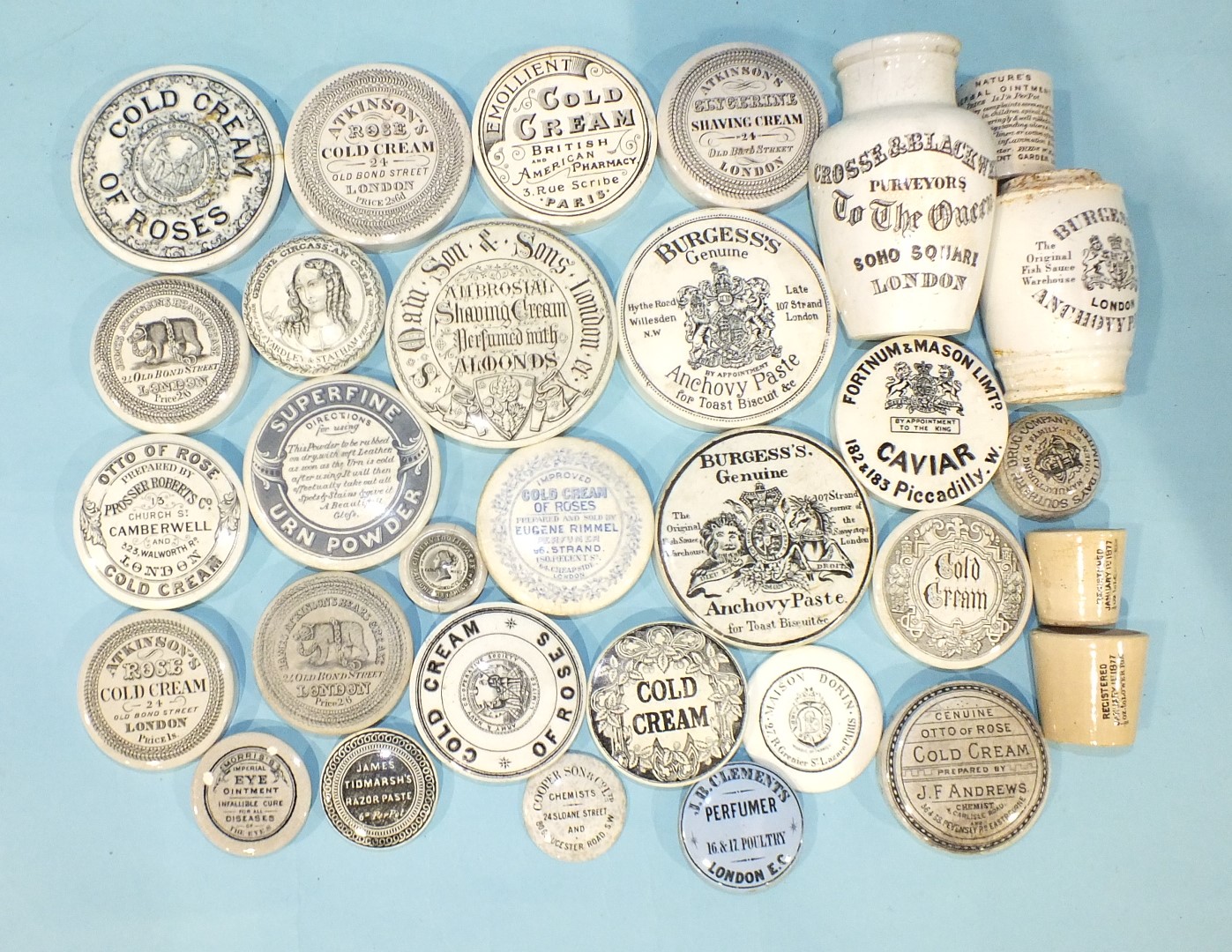 A 'Burgess's Anchovy Paste' pot lid and twenty-four other 19th century advertising pot lids and