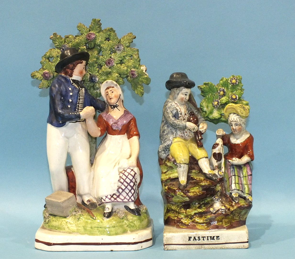 An early-19th century Staffordshire pearlware group Pastime and a similar group The Sailor's Return,