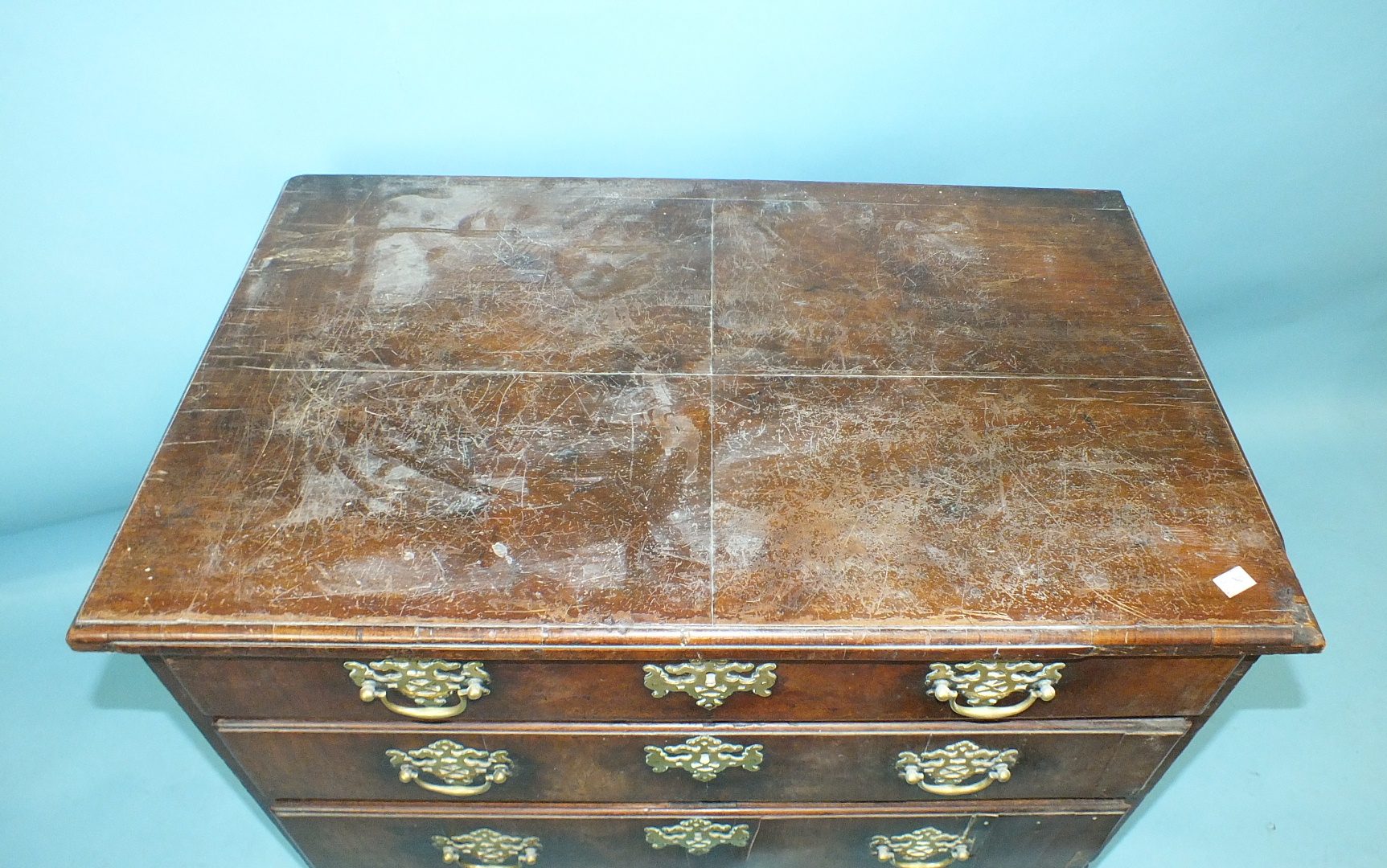 An early-18th century mahogany small chest of four long drawers, on bracket feet, 83cm wide, 79cm - Image 2 of 5