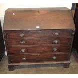 A George III mahogany bureau with fall front and fitted interior, above four cockbeaded drawers,