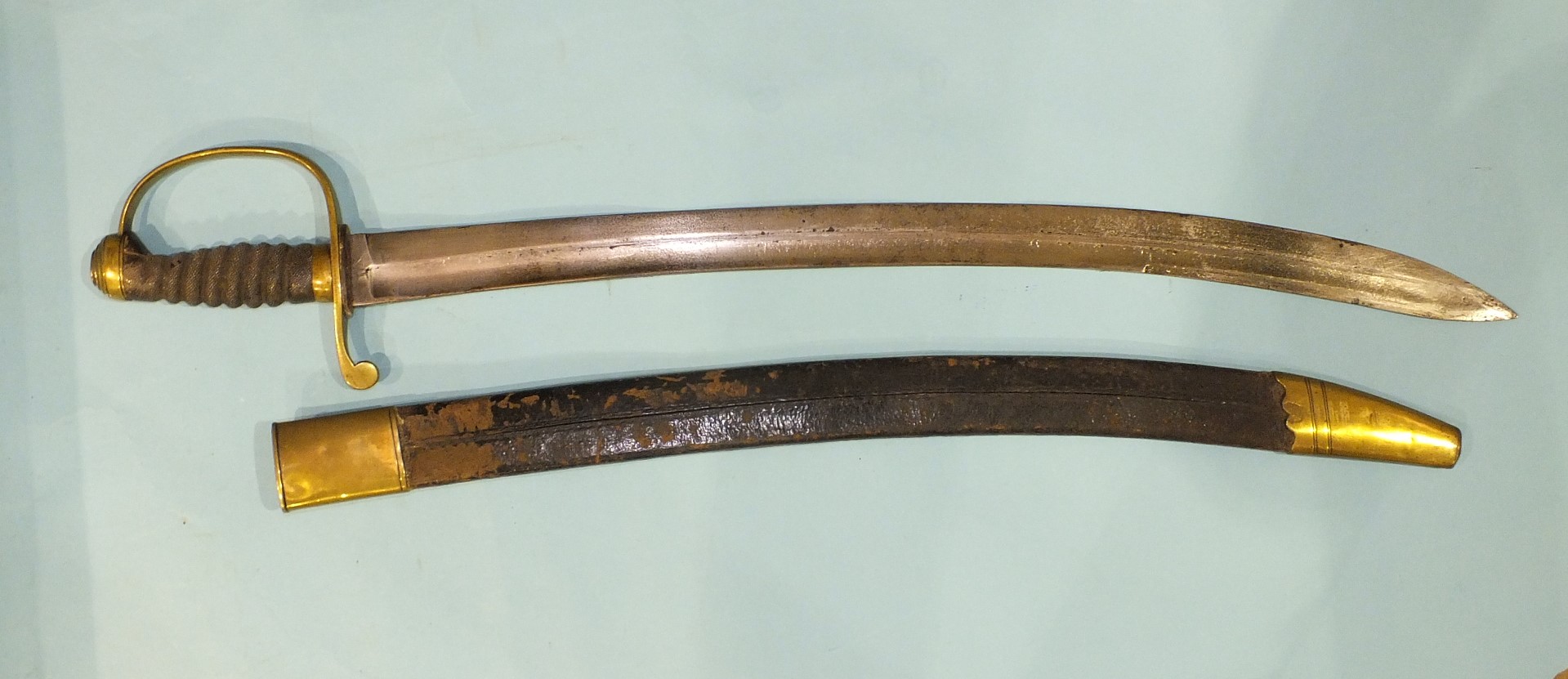 A brass stirrup hilted short sabre with fish-skin grip and 61cm slightly curved blade in brass - Image 2 of 4