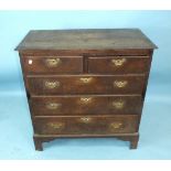 An 18th century oak rectangular chest of two short and three long drawers, on bracket feet, 90cm