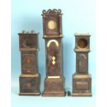 Three watch holders in the form of long case clocks, 40cm, 30cm and 29cm, (a/f), (3).