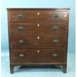 A Late-George III mahogany rectangular chest of four long drawers, decorated with boxwood lines,