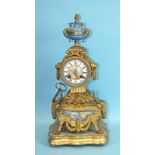 A 19th century French gilt spelter and porcelain mounted mantel clock with bell-striking drum