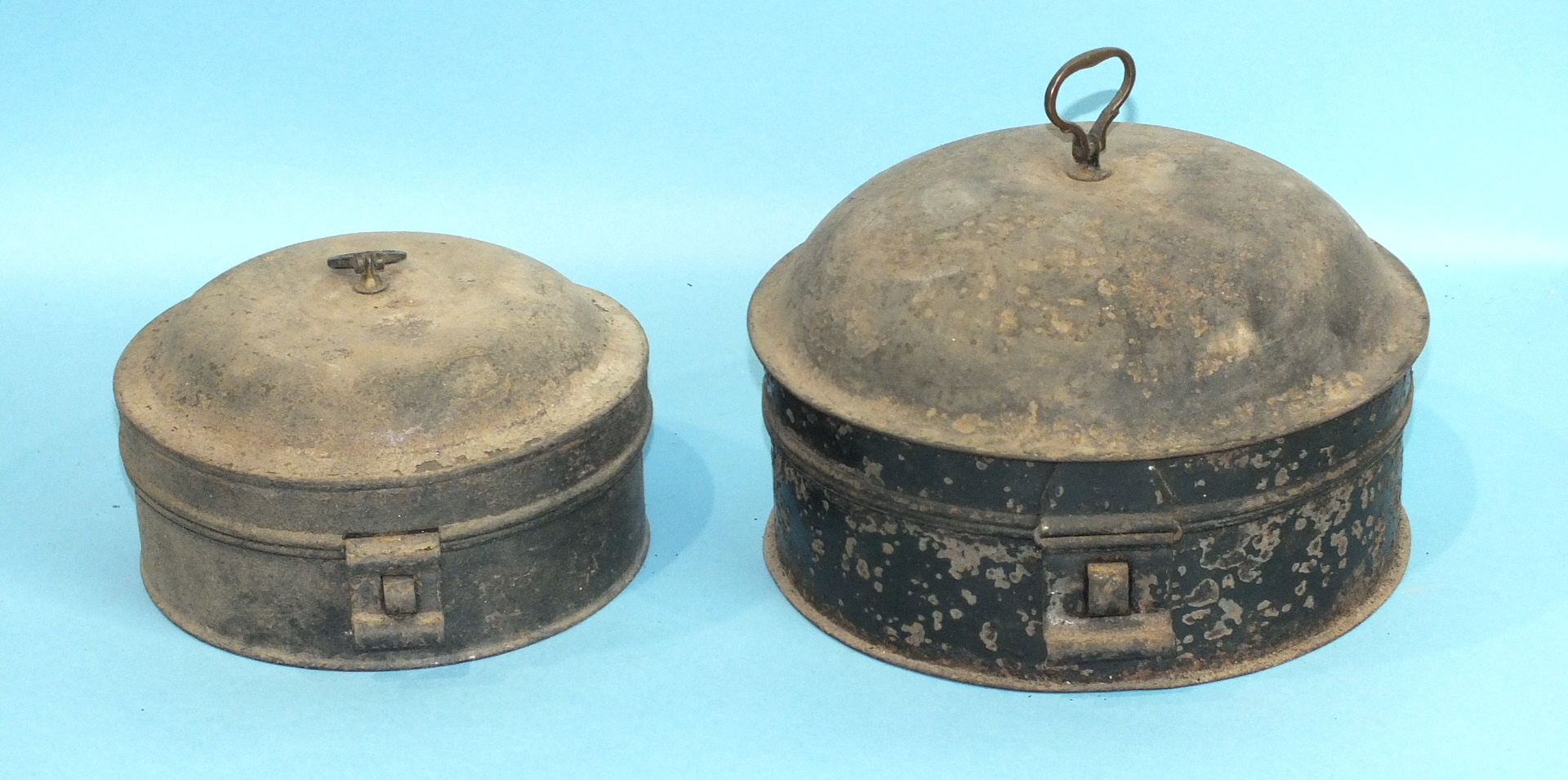 A Georgian japanned metal circular spice-tin complete with nutmeg grater and carrying handle and a