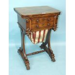 An early-19th century rosewood games and work table, the folding swivel top with satinwood and ebony