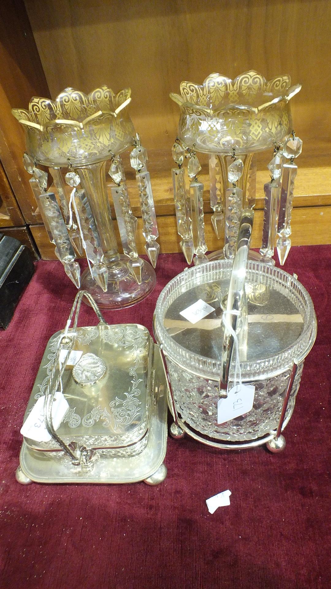 An electro-plated sardine dish stand with cut-glass dish, a cut glass biscuit barrel on plated stand