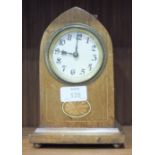 An Edwardian inlaid mahogany lancet shaped mantel clock, 20cm high and a brass standard lamp in