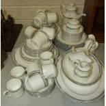 Approximately seventy pieces of Royal Doulton 'Charade' tea, coffee and dinner ware and a large