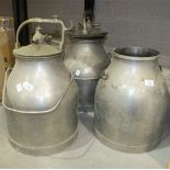 Three galvanized metal milking churns, two with lids, 52cm high.