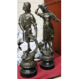 A pair of spelter figures of a fisherman and woman, 39cm.