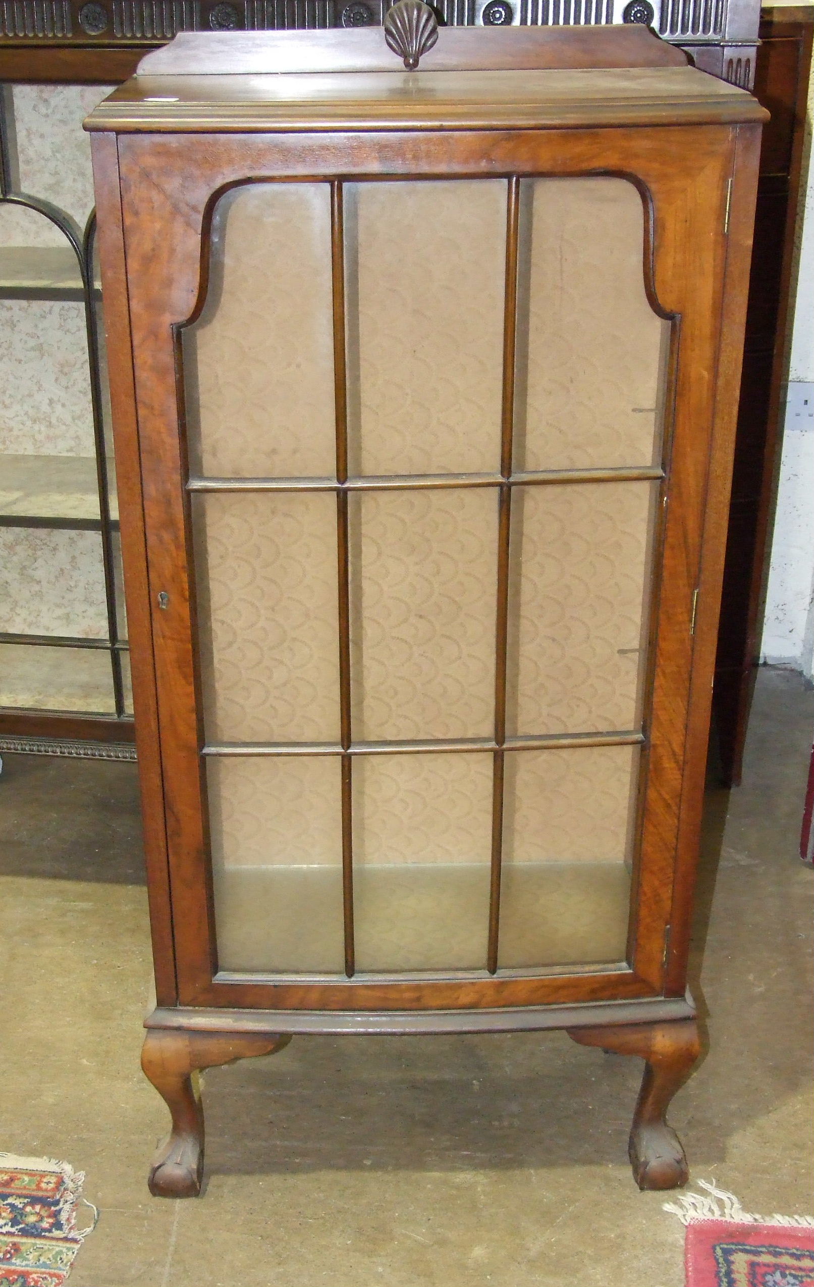 A mahogany display cabinet the rectangular top above a pair of astragal glazed doors on square - Image 2 of 2