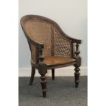 A Victorian child's bergere chair on turned legs (metal strengthening bracket), a basket planter