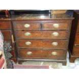 An antique oak chest of two short and three long drawers, on bracket feet, 102cm wide.