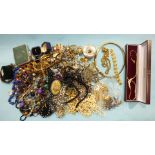 A Trifari bracelet, a Monet chain necklace and other costume jewellery.