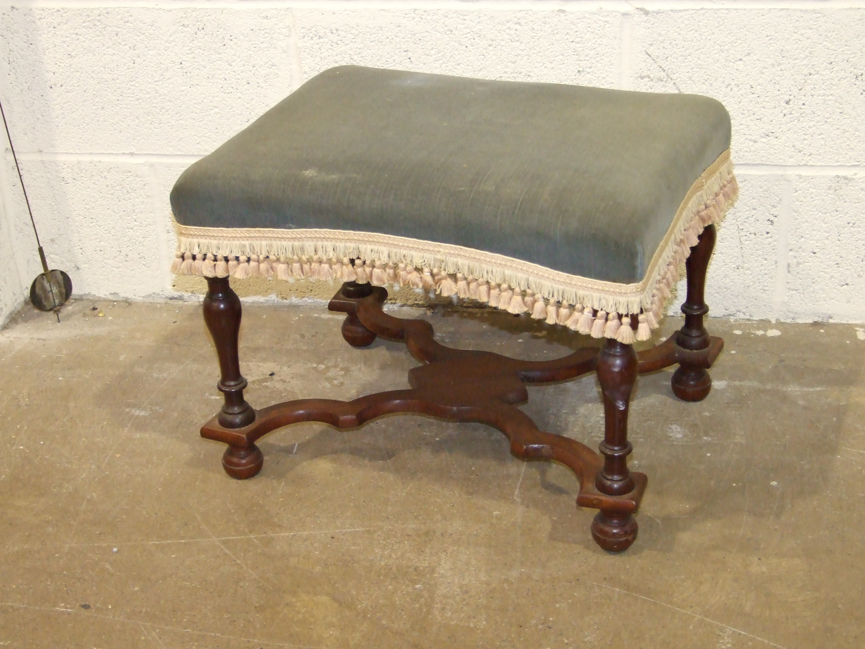 An Edwardian low nursing chair with upholstered back and a 20th century mahogany stool, (2).