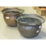 A pair of copper planters, each with embossed decoration and stamped Townshends Ltd, 31cm