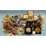 A quantity of costume jewellery and watches.