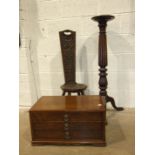A mahogany torchére a "Welsh" carved spinning chair and a walnut three-drawer canteen, (fitments