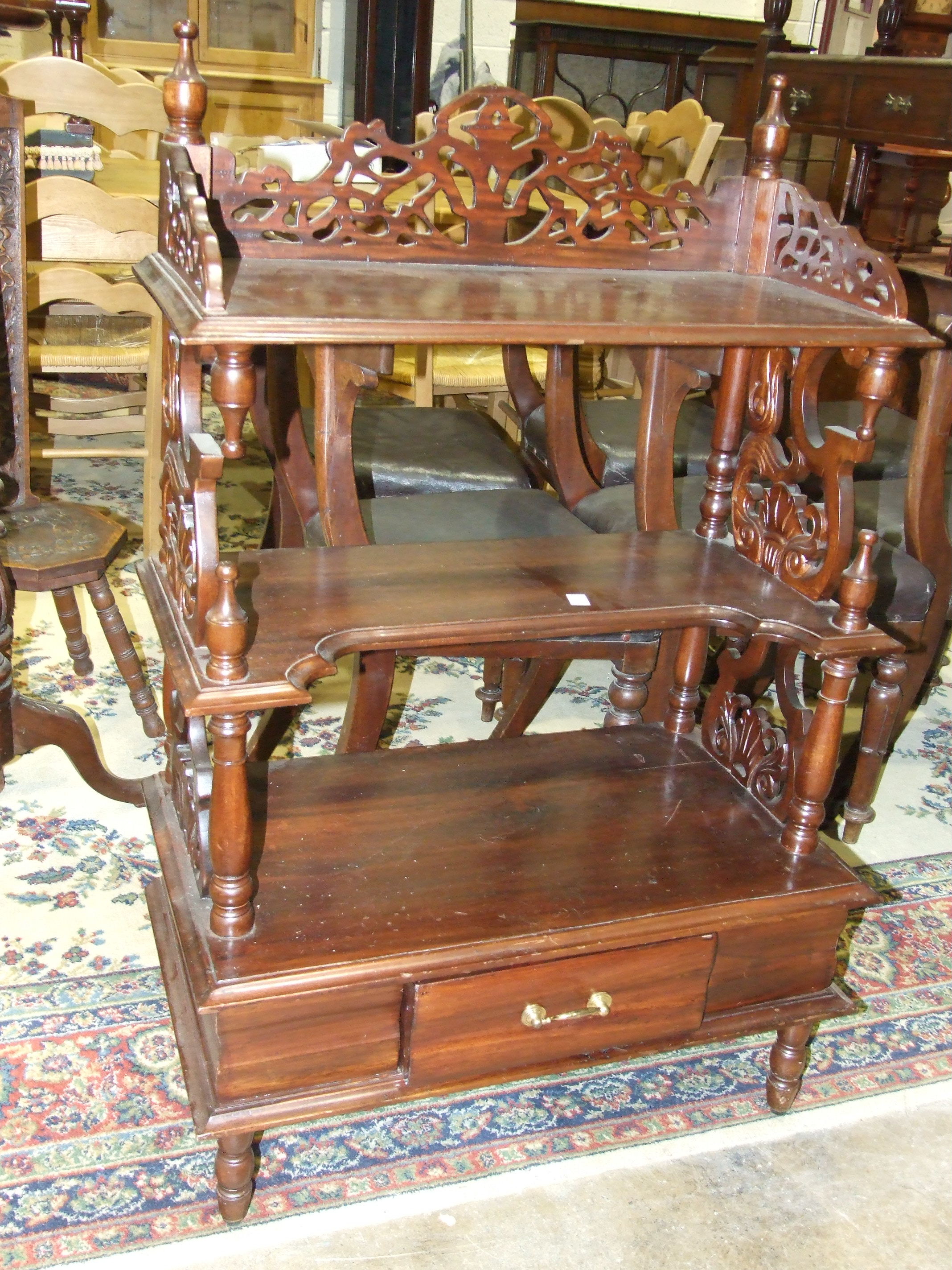 A reproduction hardwood three-tier whatnot fitted with a drawer, 70 x 180cm and a reproduction