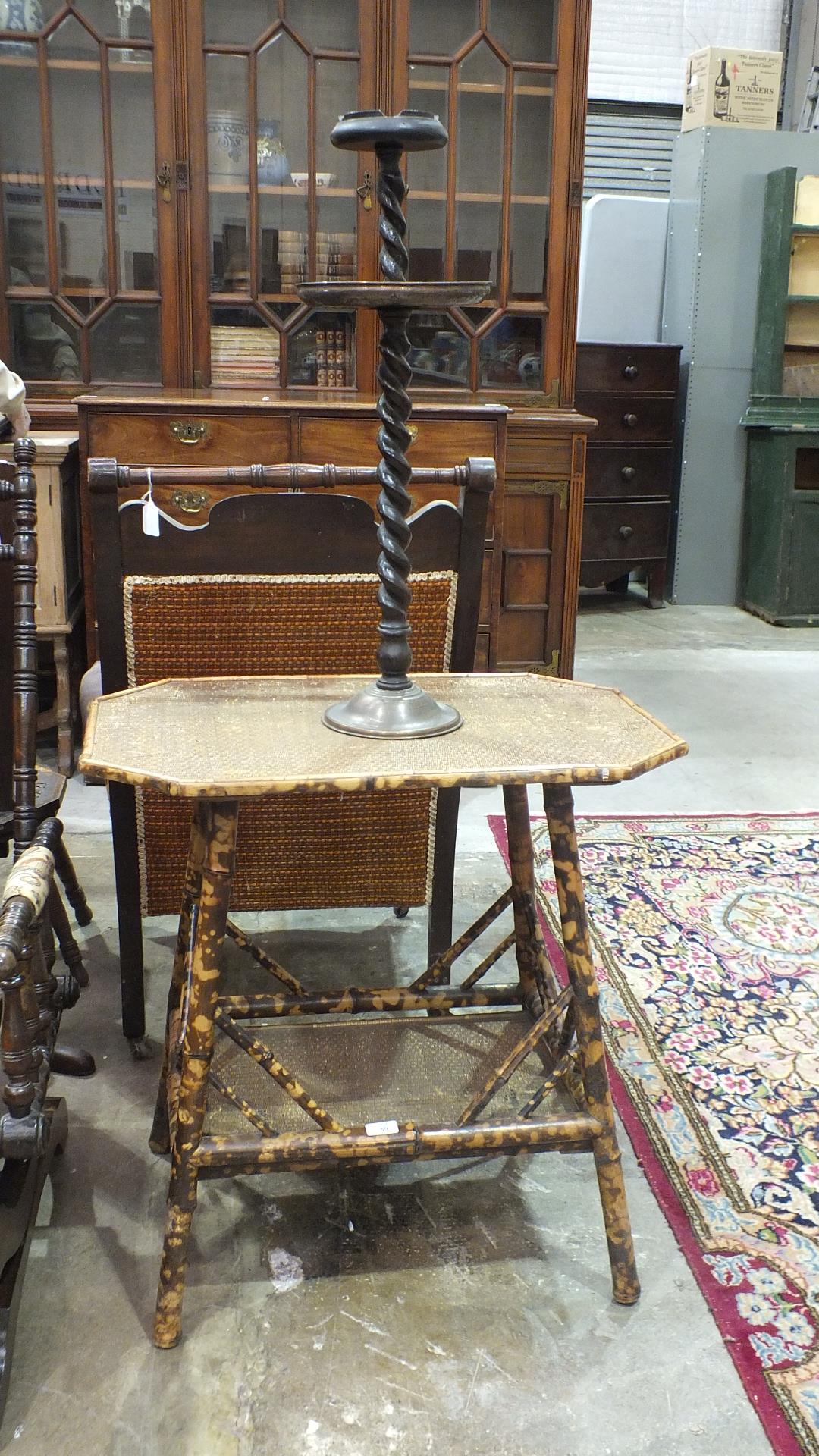 A two-tier bamboo table and a smokers' stand.