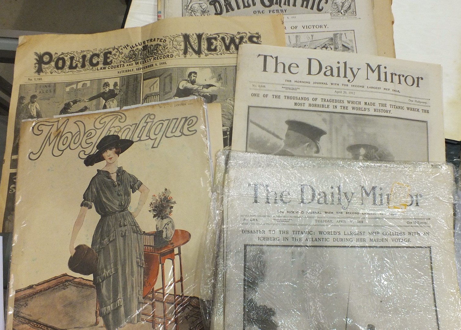 A collection of historic newspapers, mainly First and Second World wars, and other items.